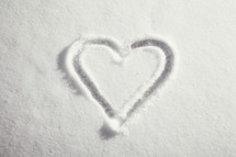 Heart drawn in the snow.
