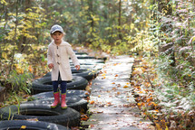 a little girl on a nature trail 