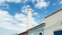 Lighthouse in Punta Secca city in Sicily in daylight