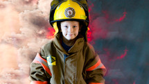 child pretending to be a firefighter 