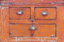 wood drawers with drawer pulls background 