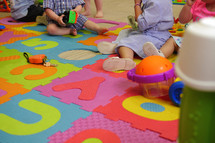 toddlers on an ABC mar at preschool 