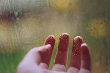glitter on fingertips
