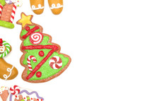 gingerbread house cookie and Christmas tree cookie 