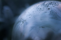 Macro closeup of a frozen ice bubble - jack frost details, shallow depth of field