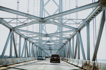 cars crossing over a bridge 