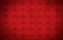 red hearts on red background 
