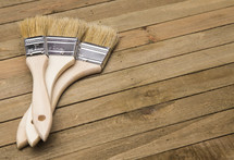 paint brushes on wood 