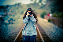 woman taking a photograph 