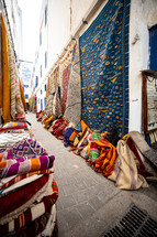 rugs in a market in Morocco 