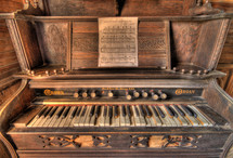 an old dusty piano 