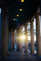 sunburst through columns 