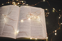 fairy lights on an open Bible 
