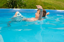child in a pool 