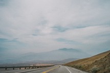 fog over a mountain road 