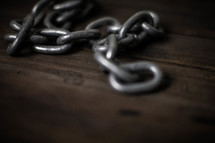 chain links on wood 