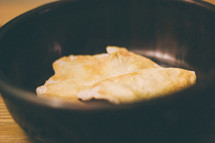 Host bread in a bowl.
