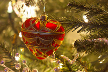 heart Christmas ornament hanging on a Christmas tree