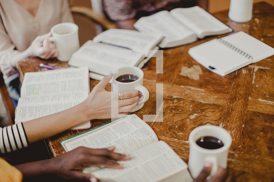 coffee and Bibles on a table at a Bible study 