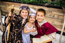 kids in costume for a Christmas pageant 