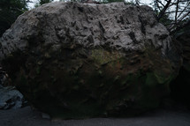 large boulder on a beach 