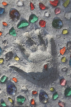 child's handprint in concrete craft 