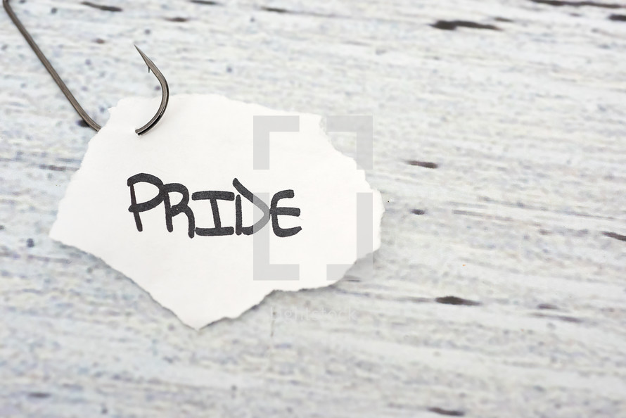 fish hook on paper with the word pride 