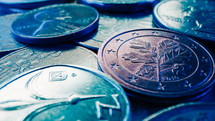 Macro view coins different world currencies. Finance, money, cents, tips concept