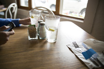 glasses of water on a table in a restaurant 