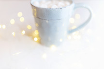fairy lights and a mug of hot cocoa 