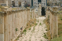 ancient columns lining a roman road
