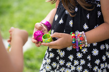a girl child with bracelets 