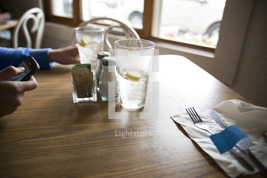 glasses of water on a table in a restaurant 