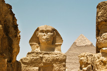 The Sphinx and a pyramid in Giza, Egypt.