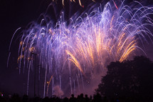 fireworks display bursting in the night sky 