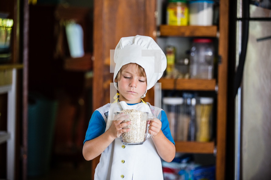 a child cooking in the kitchen 