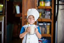 a child cooking in the kitchen 