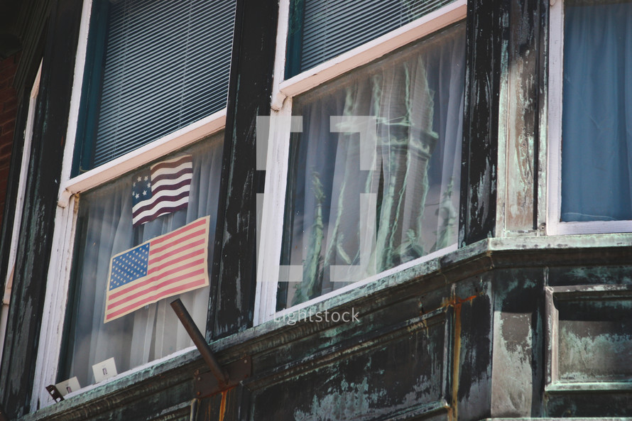 American flags in a window