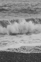 waves washing onto a shore 