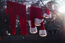 Santa suit drying on a clothesline 