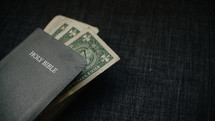 dollars in a Bible 