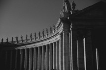 statues lining the colonnade at the Vatican 