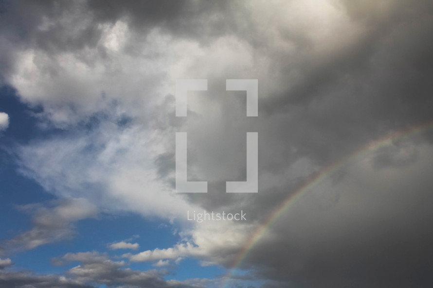 rainbow in a gray sky 