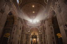 sunlight shining into st peter's basilica