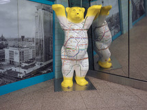BERLIN, GERMANY - CIRCA JUNE 2019: bear, symbol of the city of Berlin, with U-bahn map