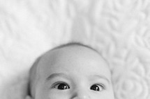 peeking eyes of an infant 