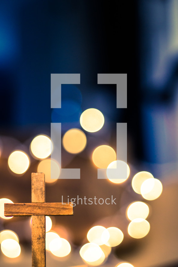 bokeh lights and cross