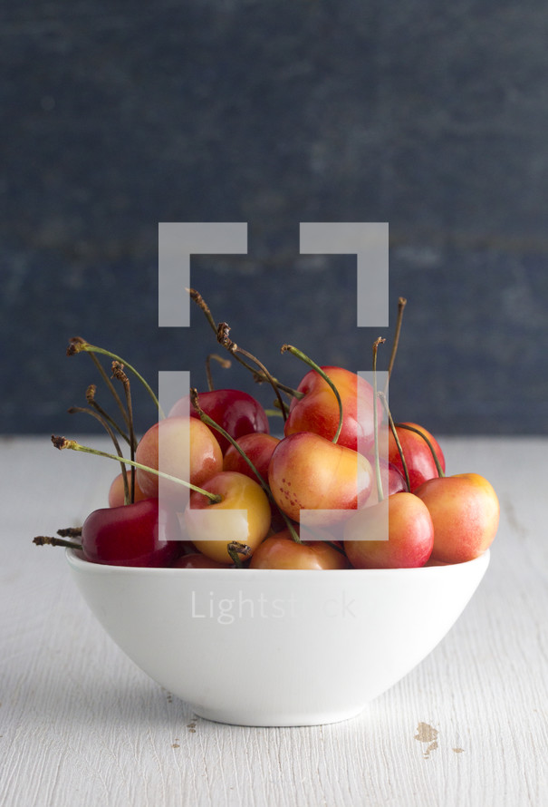 Sweet and Beautiful Red and Yellow Golden Cherries on a black and White Background