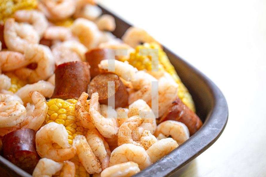 Shrimp Bake with Sausage Corn on the Cob and Potatoes Baked Together with Southern Cajun Seasonings