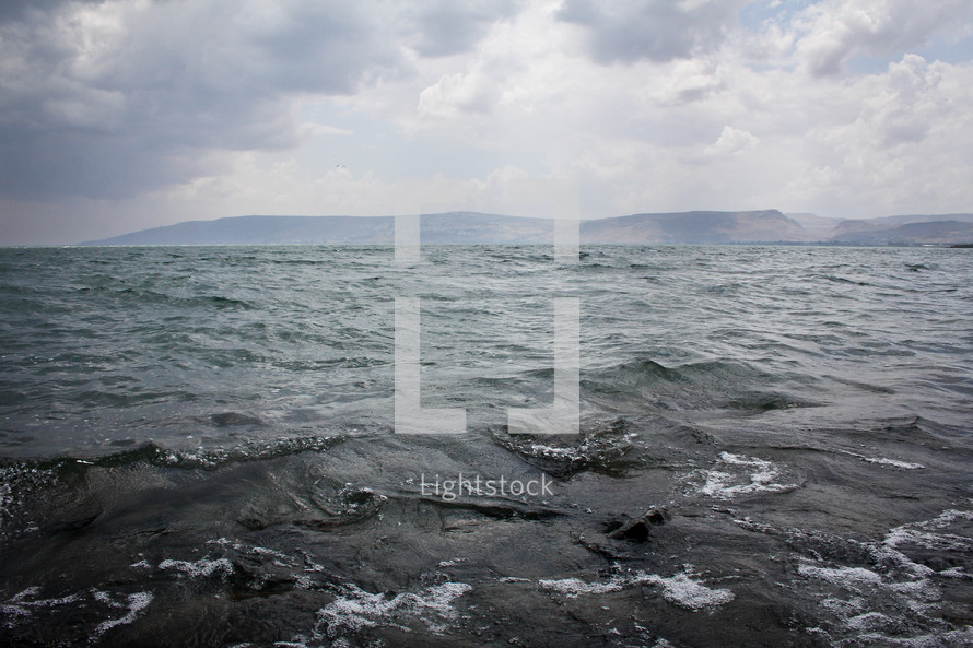 The Sea of Galilee with mountains in the background,